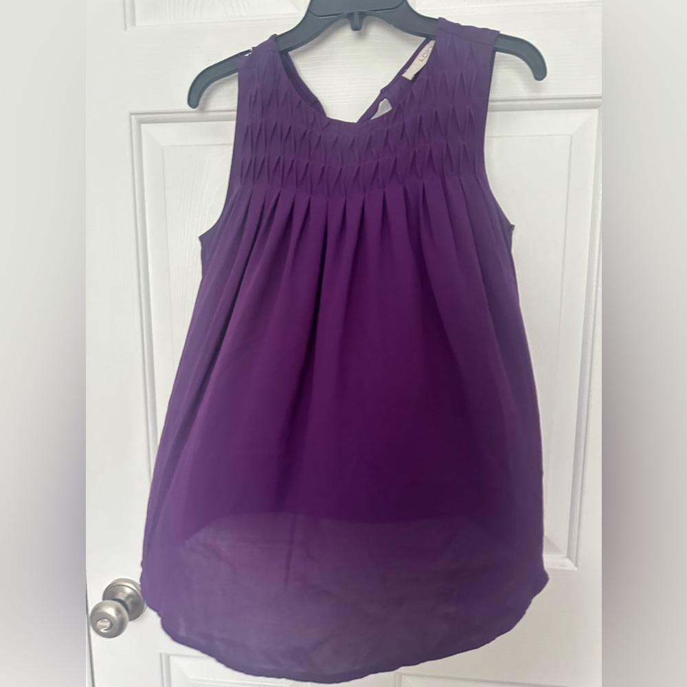 Sleeveless back tie neck blouse